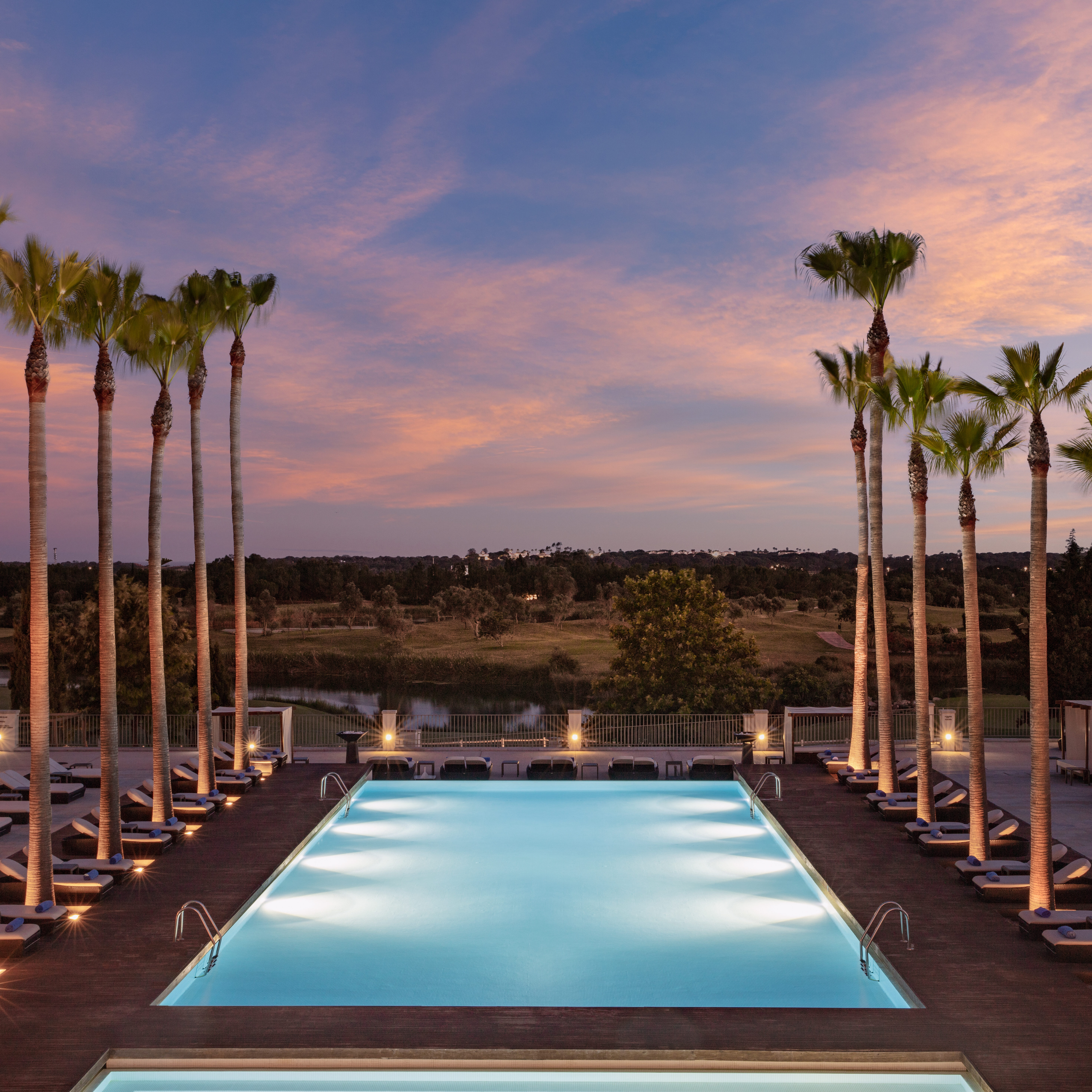 Victoria_Golf_Resort_&_Spa_Main_Pool_Evening_Golfcourse_View